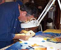 Roger Bacharach creating sea life collages